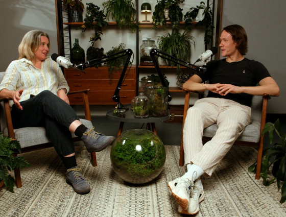 Ben being interviewed, surrounded by plants 